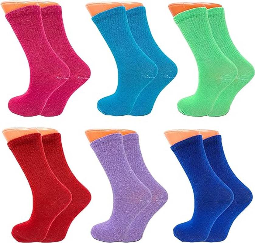 Six pairs of colorful women's tennis crew socks in pink, blue, green, red, purple, and navy, designed for breathability and all-day comfort
