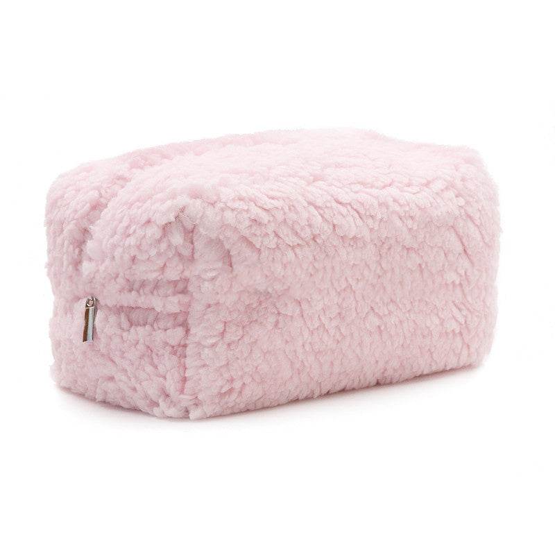 Pink zipper closure plush cosmetics bag made of soft towel cloth material