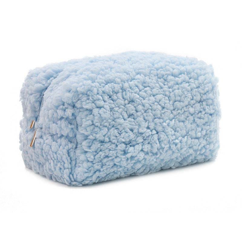 Blue zipper closure plush cosmetics bag made of towel cloth with a soft texture